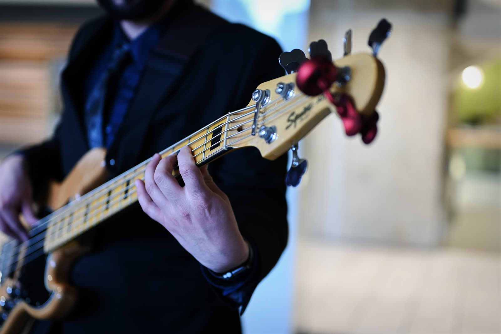 Close-up of the electric bass during a performance