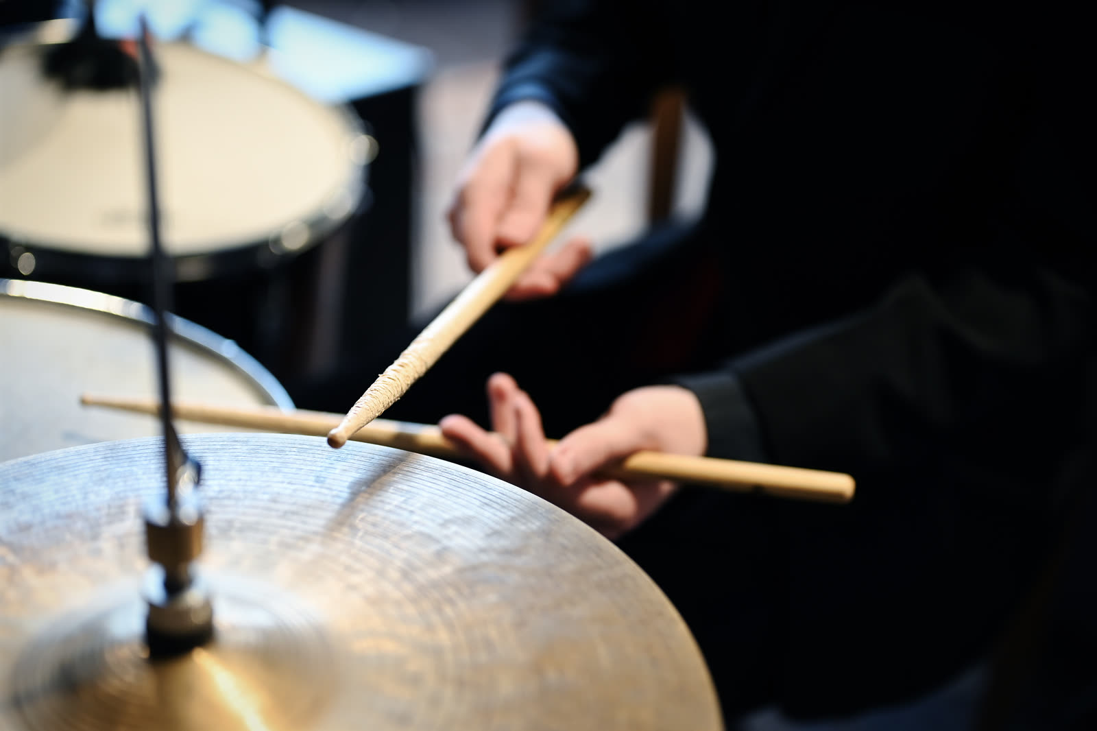 Drummer playing during a 5 O'Clock Five set