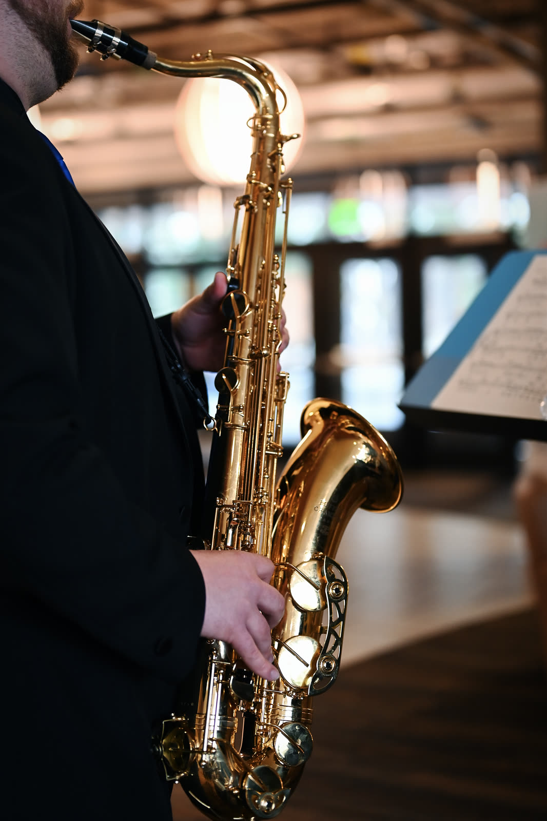 Saxophonist performing with the band
