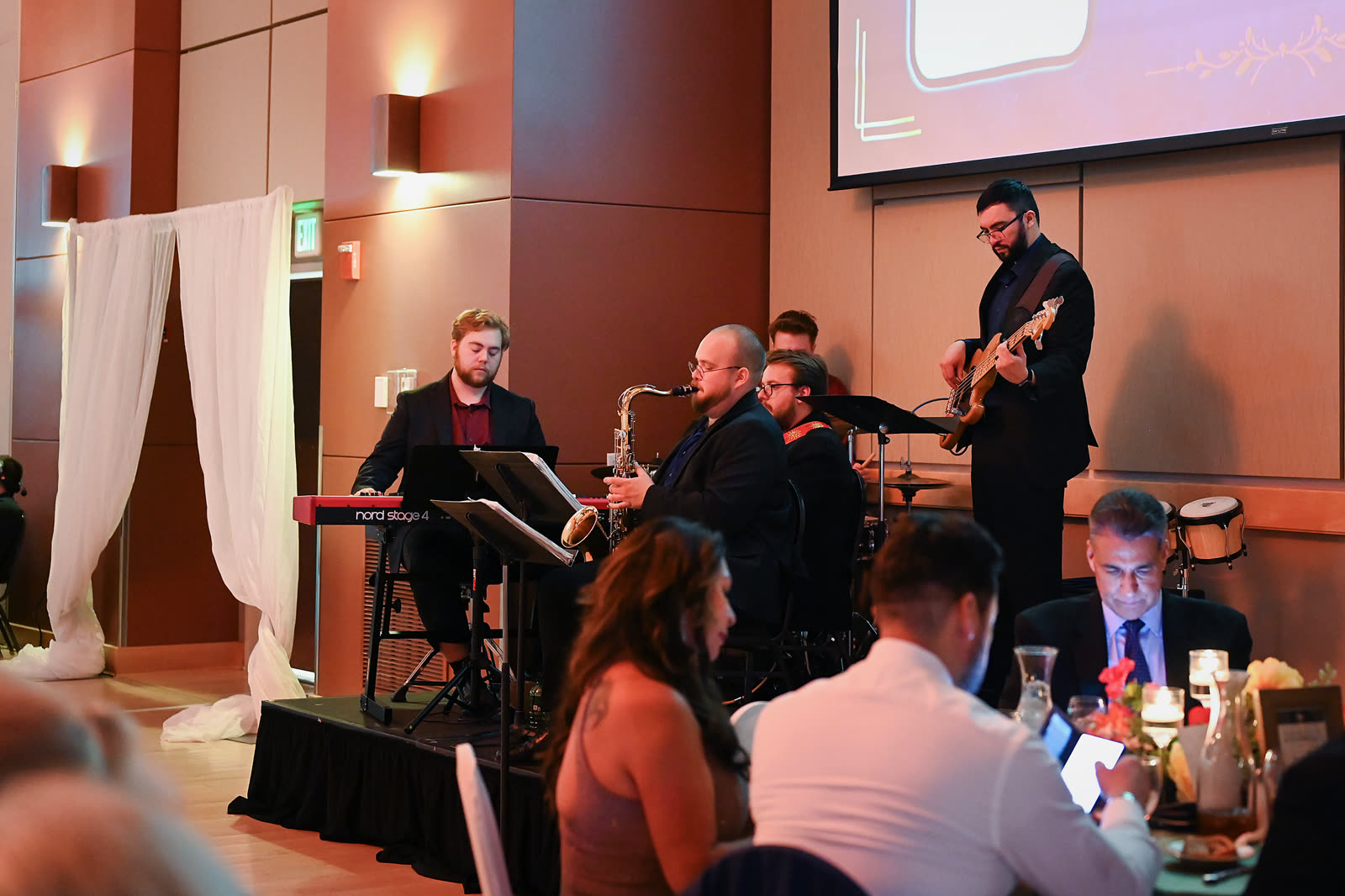 5 O'Clock Five performing for an event audience
