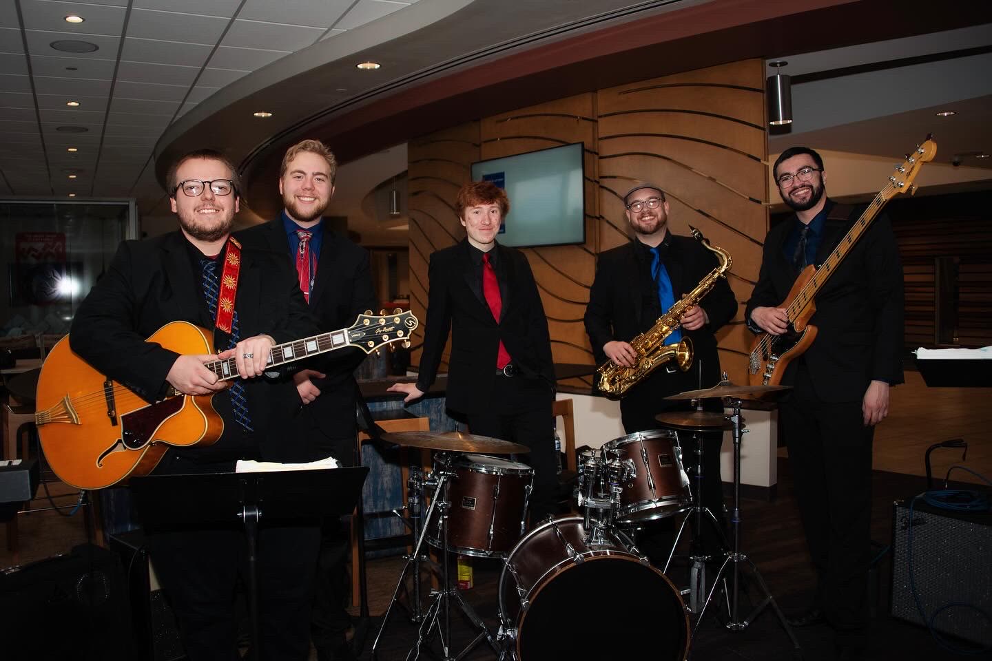 5 O'Clock Five band portrait with instruments